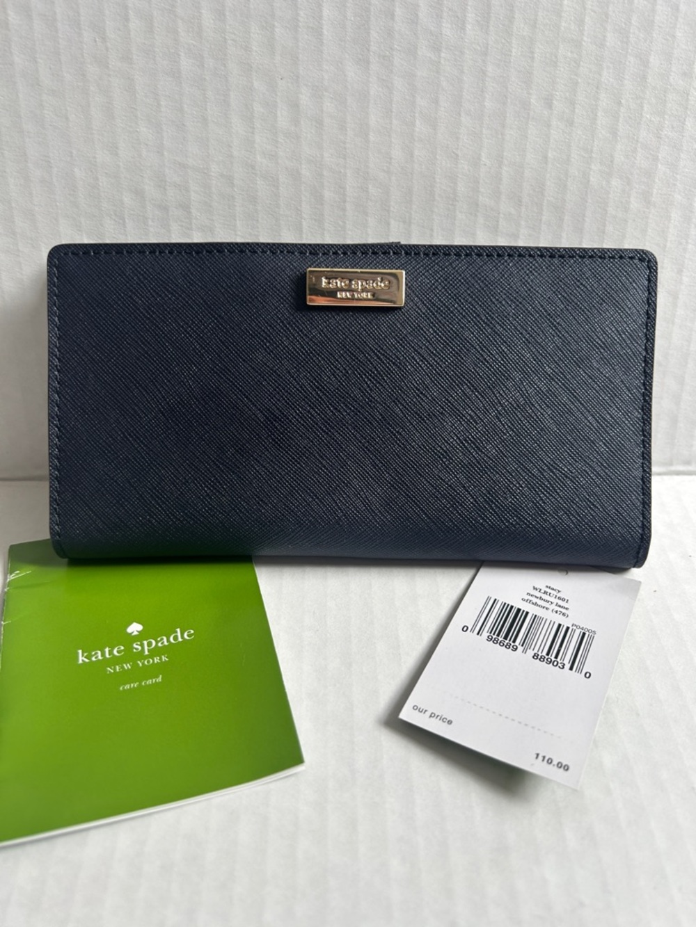Kate Spade Newbury Lane Stacy Bifold Wallet In Navy Leather
